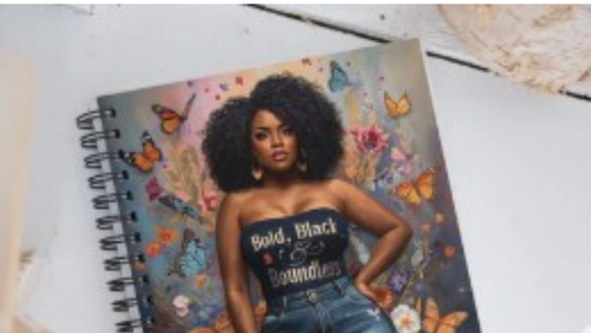 Bold Black and Boundless spiral journal with Afrocentric artwork designed for Black women, open to dotted pages for journaling and emotional healing practice