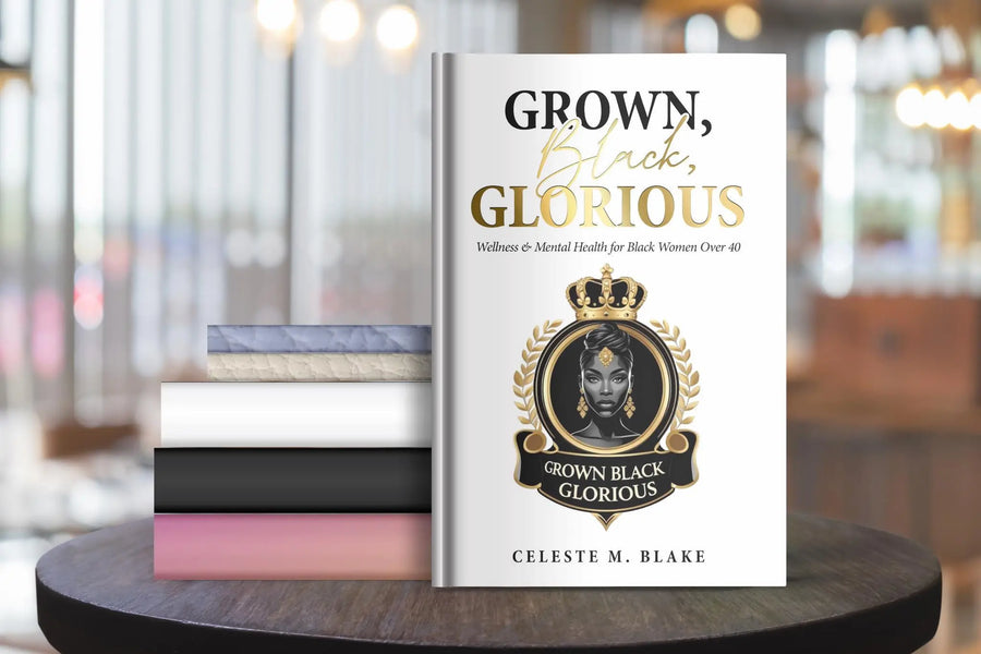 Grown, Black, Glorious hardcover resting on a café table beside a stack of the bundle's other titles.