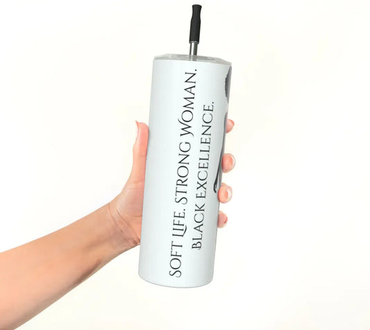 Close up of 20 oz travel mug with double wall insulation and durable metal straw for hot and cold drinks.