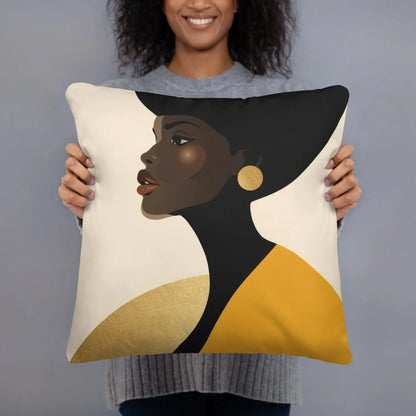 Decorative throw pillow featuring artistic portrait of a Black woman in gold and black tones; luxury home decor symbolizing Black feminine power and elegance.